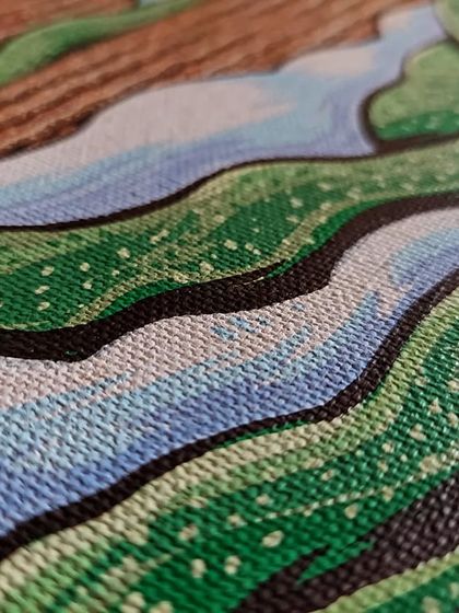 Another close-up, focusing on the strong black outlines and the texture of the acrylic marker on the canvas.