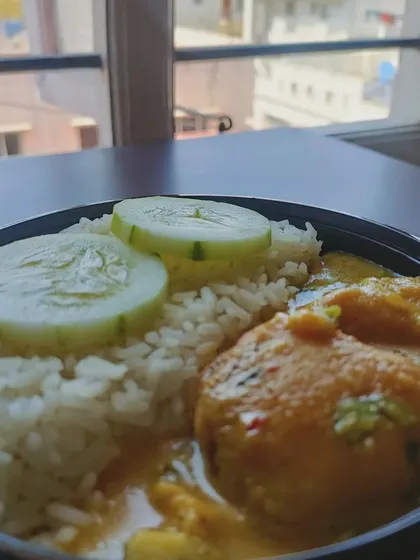 A simple, comforting bowl of Kadhi Chawal. This is the kind of food that just feels like a hug. It’s light, flavorful, and perfect for a satisfying lunch, served with fresh rice and cucumber slices.