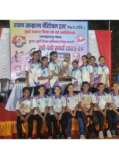 Our girls' team with the winners' trophy at the Mumbai Suburban District Championship.
