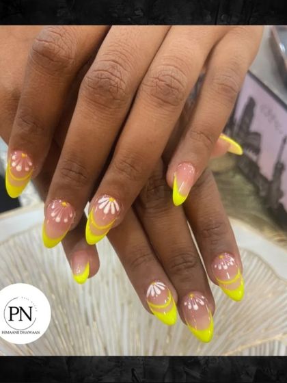 Bright and cheerful. This design uses a neon yellow base with delicate white daisy art for a fun, summery vibe.