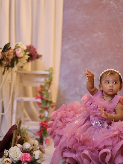 Explore our various floral and elegant setups. These sets feature props like swings, ornate chairs, and pearl decorations, all surrounded by beautiful flowers for a timeless and pretty photoshoot.