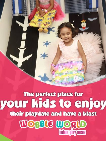 A young girl enjoying her birthday gift as she comes down the slide. Our play area is the perfect backdrop for birthday celebrations.