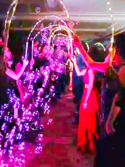 Crafting a magical bubble tunnel for the couple's entry. It's these little details that I help plan to make a Sangeet entrance truly spectacular and photo-worthy.