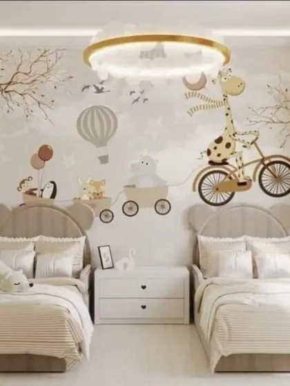 We brought a storybook to life in this whimsical children's bedroom. The charming animal and hot air balloon wall mural creates a focal point for imagination, complemented by adorable bear-themed headboards for a cozy and playful space.