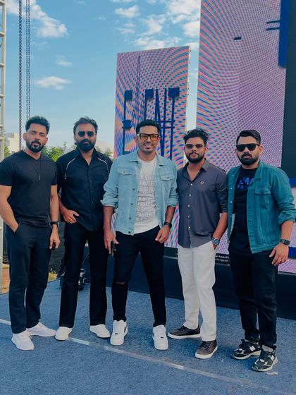 Another group shot on the festival stage before the show. The calm before the musical storm.