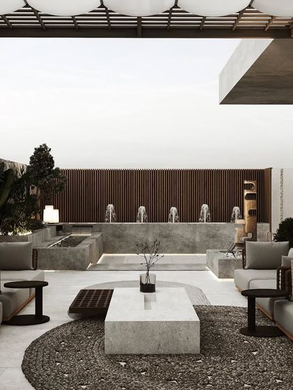 This design features a central water fountain feature, creating a soothing soundscape for the rooftop lounge. The symmetrical seating arrangement adds to the formal, elegant feel.