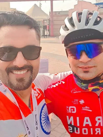Two members in their matching race jerseys. We are a team, and we look the part.