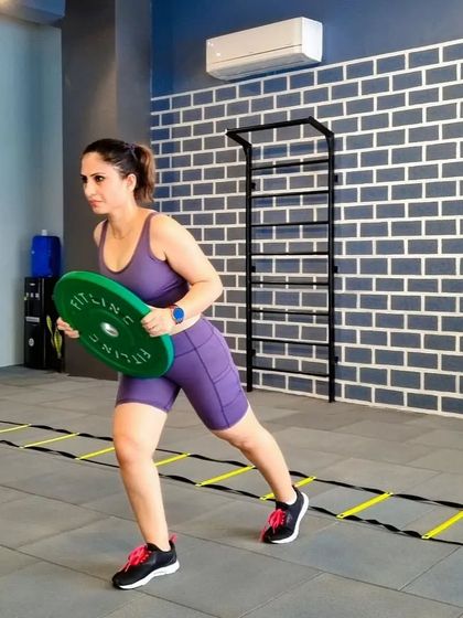 Weight training is critical for women. It increases bone density, strengthens muscles, aids in weight loss, and improves mental health. Here, I'm doing weighted lunges, a great functional exercise.