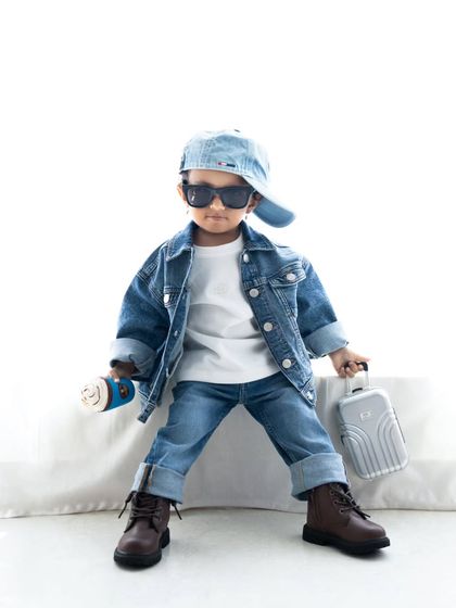 A confident pose from our little model, showing off his sunglasses and cool-guy stance.
