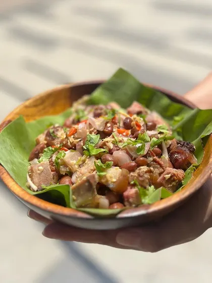 A new addition to our menu, this Smoked Pork and Kholar Beans Salad is a healthy yet flavorful option. The smoky pork is tossed with fresh, nutty Kholar beans, onions, and herbs.