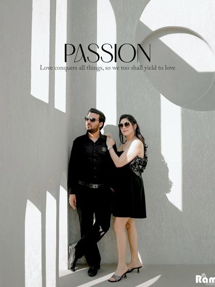 A cool and stylish couple portrait against a minimalist architectural background. The strong shadows and their confident poses give this pre-wedding shot a very modern and passionate vibe.