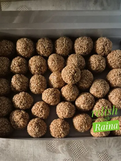 A box of my classic white Til Laddoos, neatly arranged. These are a great way to boost immunity and enjoy a traditional sweet.