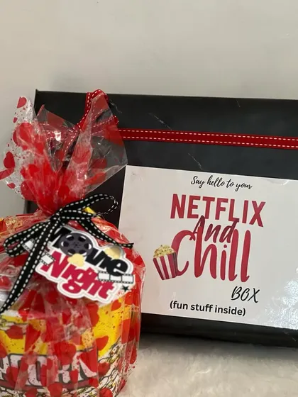 The "Netflix and Chill Box" all wrapped up and ready to gift. It's a fun and easy gift for a friend, partner, or anyone who loves a good binge-watching session.