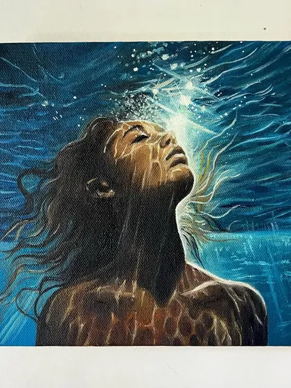 This piece, 'Below the Surface', is a deeply personal oil painting. It explores finding peace even when facing fears, showing a serene figure underwater, bathed in light. It's a small 8x8 inch canvas with a lot of emotion.