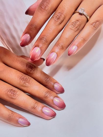 The perfect ombre chrome manicure for a polished and sophisticated look.