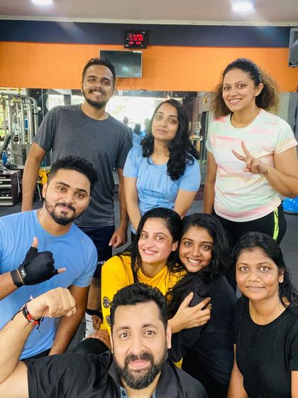 A fun group selfie after a tough workout. We always find a reason to smile.