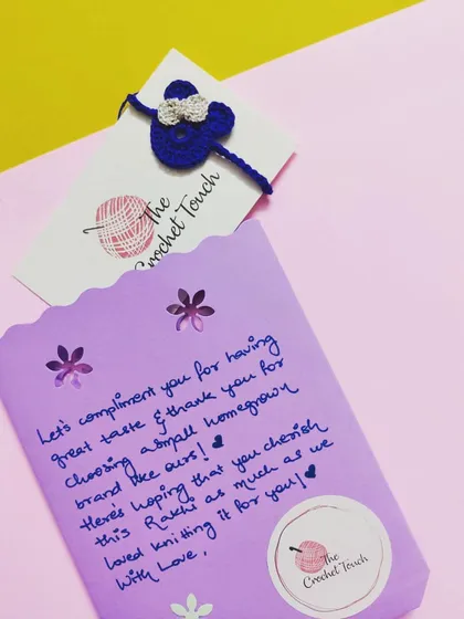 One of our handmade rakhis packaged with a personal, handwritten thank you note. We love adding these small touches to show our appreciation for supporting our homegrown brand.