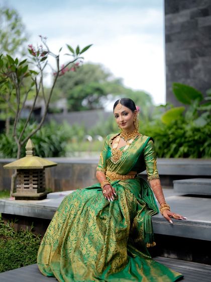The complete bridal look, from the expertly draped saree to the perfectly placed jewelry and makeup. I ensure every element comes together to create a picture-perfect bride.