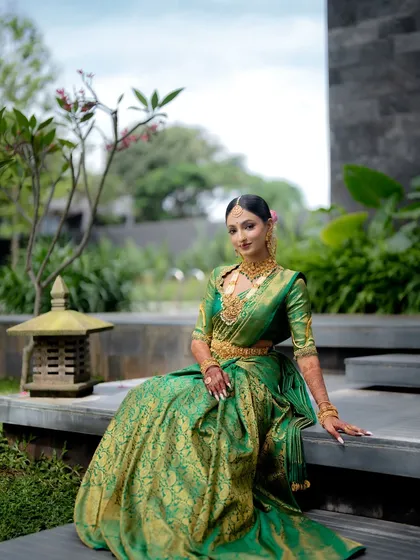 The complete bridal look, from the expertly draped saree to the perfectly placed jewelry and makeup. I ensure every element comes together to create a picture-perfect bride.
