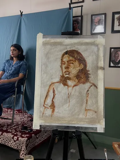 The beginning of my live session with Mirra. This is the initial drawing on the 9x12 inch oil on linen canvas, with Mirra posing in the background.