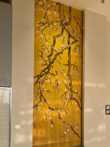 A full view of the completed yellow textured art panel.