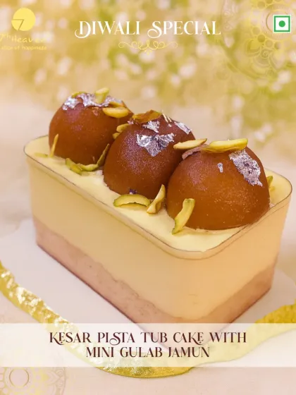 A royal treat for Diwali. Our Kesar Pista Tub Cake is layered with saffron and pistachio flavors and topped with mini gulab jamuns for an indulgent festive dessert.