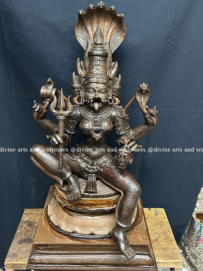 The wax work of a 2-foot Pratyangira statue. This fierce form of the goddess, with her lion face and multiple arms, is a powerful protector against negative forces.