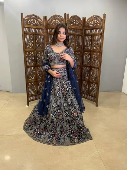 The full look of this stunning navy blue lehenga, perfect for a reception or a family wedding.