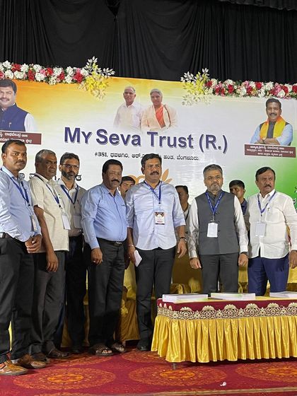 A group photo with the team behind the successful notebook distribution drive.