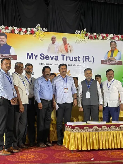 A group photo with the team behind the successful notebook distribution drive.