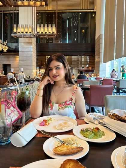 A seated shot from my collaboration with Crowne Plaza Rohini. This image showcases the elegant dining atmosphere, perfect for promoting luxury hotel experiences.