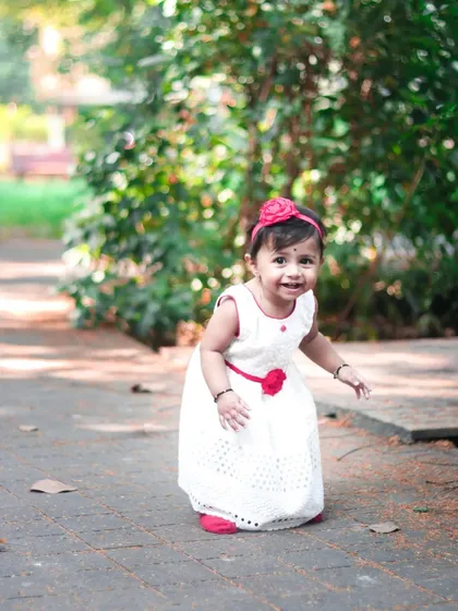 Capturing the excitement of a toddler exploring a park path. I let kids be kids, which results in genuine expressions and dynamic photos.