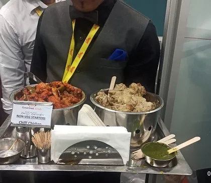 A tray of spicy Chilli Chicken, a popular Indo-Chinese starter or main course. I also offer creamy Malai Chicken for those who prefer milder flavors.
