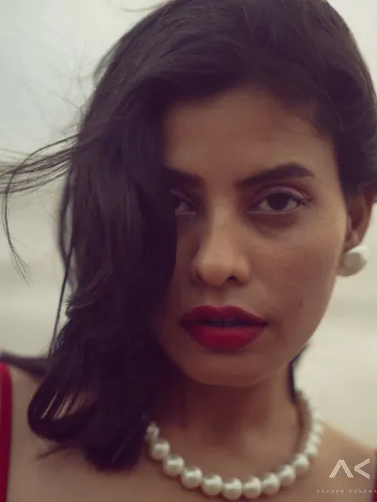 A great portrait is an honest one. This close-up from a beach session focuses on a genuine expression, with the wind and natural light adding to the moment. My editing process ensures skin looks like real skin, not plastic.