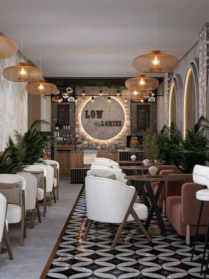 This "Low Calories" cafe features a rustic-chic design with exposed stone walls, woven pendant lights, and plenty of greenery. The black-and-white patterned floor runner adds a graphic punch.