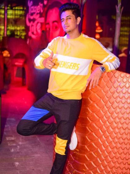 A casual pose at the club. This is my office, and I'm always ready for the next party.