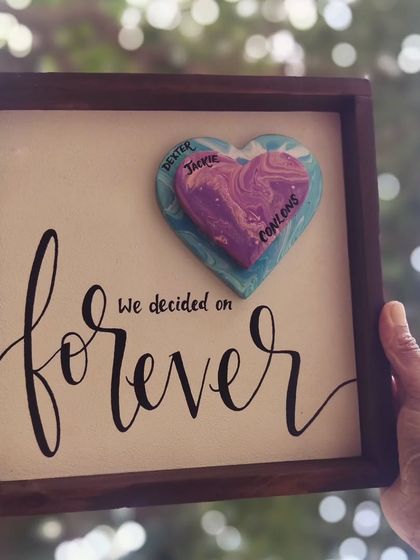 A beautiful piece to celebrate love that lasts forever. This framed wooden sign, with hand-painted calligraphy and a 3D heart, was created to mark a special 28th wedding anniversary.