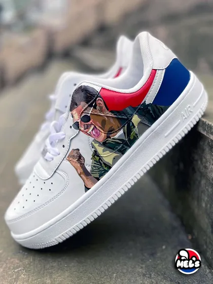 A side profile of the Tom Cruise portrait sneaker, showcasing the detailed artwork and color blocking.