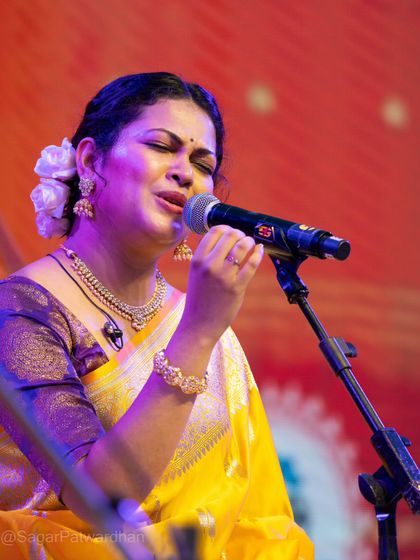Lost in her music, Priyanka Barve looks ethereal in the yellow Banarsi saree, with white roses in her hair adding a classic touch.