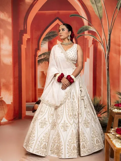 This selection showcases the breadth of my bridal and couture curation. It includes a variety of lehengas, gowns, and sets in different colors and styles, from traditional reds by Anupraas to modern ivories by Mirroir and Varun Chakkilam, ensuring every bride finds her perfect look.