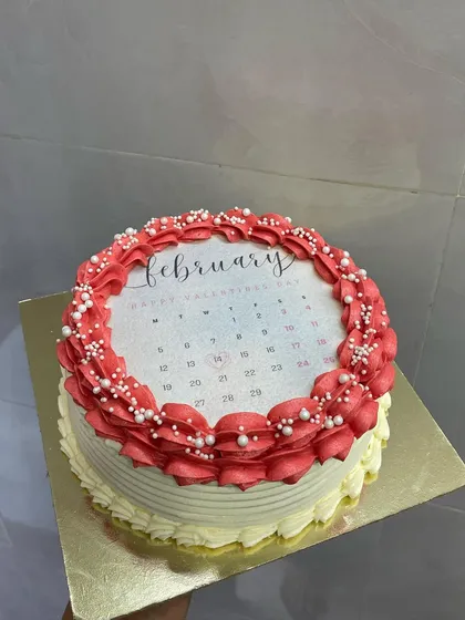 A pretty-in-pink version of my burn away cake, featuring a Valentine's calendar design. The red and white buttercream frosting makes it a beautiful centerpiece for your celebration.