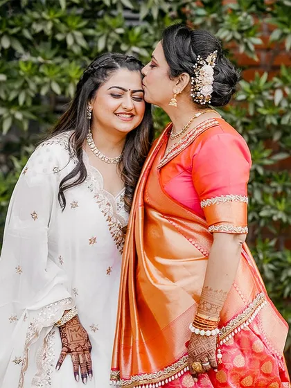 A mother's gentle kiss, a daughter's happy tears. This is the kind of precious, fleeting moment between a bride and her mom that I feel privileged to turn into a lasting memory.