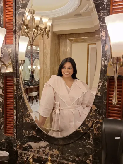 Another mirror selfie in the blush pink co-ord set, showing its elegant structure.