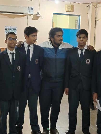 A group of students from Lions Public School pose with their instructor after an engaging workshop on emerging technologies.