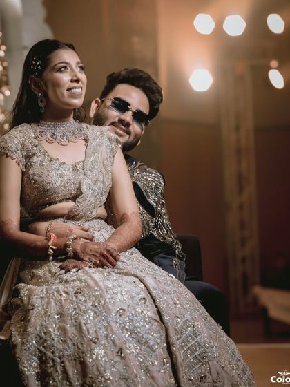 A stylish shot of the couple looking away, with dramatic backlighting that creates a cinematic feel.