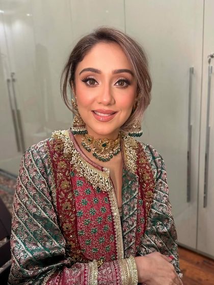 Oh-so-chic. This look for a wedding guest features a clean and sleek liner game, proving that elegance is in the details.