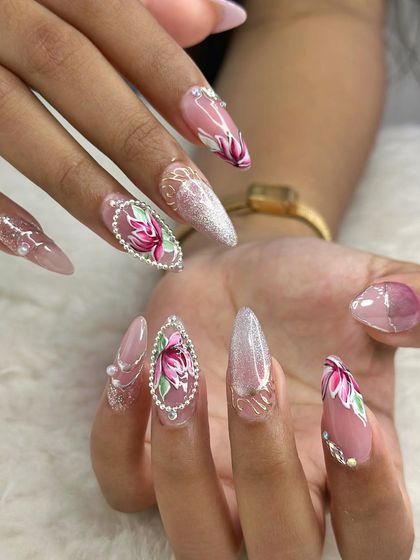 Another look at the stunning lotus flower bridal set, showing the combination of glitter, hand-painting, and pearl accents.