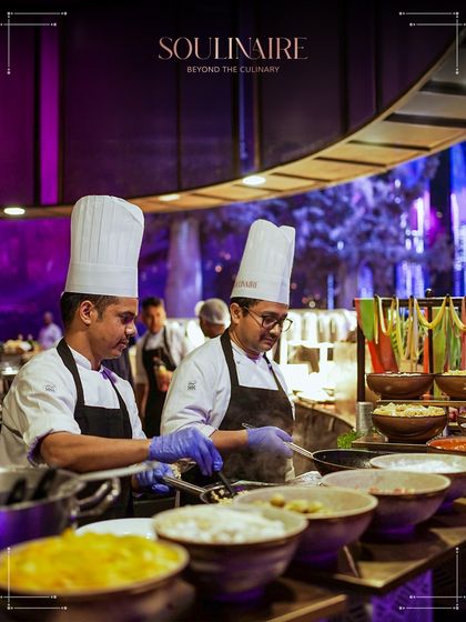 Our master chefs at a beautifully designed live station, working in harmony to craft a memorable dining experience. We blend tradition and innovation at every event.