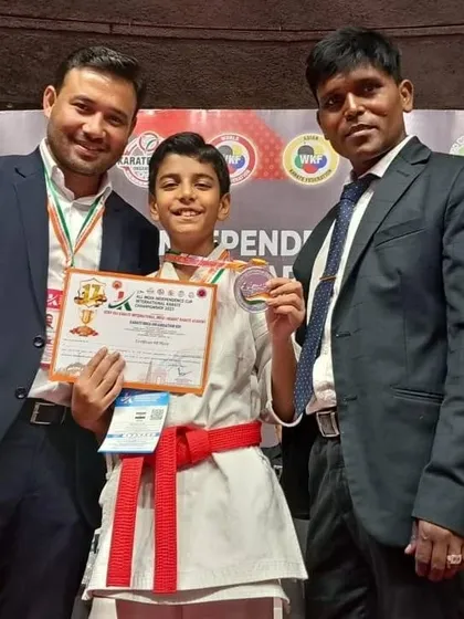 Another young champion from our academy with his medal. We nurture talent from a very young age.