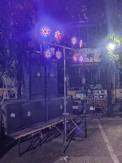 The Kojagiri event setup at night, with the colorful LED lights creating a festive mood. I can program the lights to match the music and the vibe of the event.
